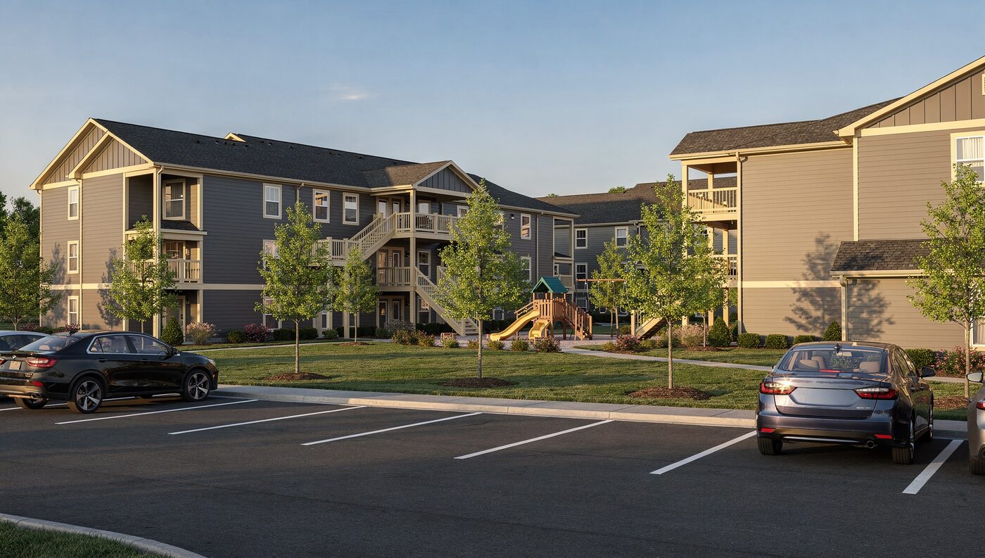Cedar Commons, a three-story garden-style apartment community with a playground on the lawn